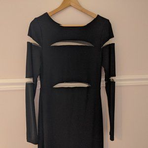 Super cute little black dress with mesh cut outs!